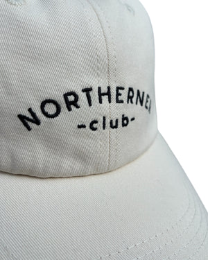 Close up of the stitching detail on a light cream white neutral dad cap with black Northerner embroidery / embroidered sports club type slogan logo. Hat for men and women - unisex. Great gift for someone from Yorkshire or Lancashire.