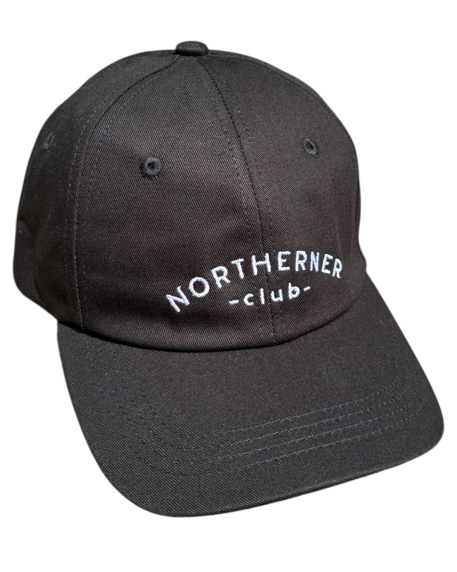 Light cream white neutral dad cap with black Northerner embroidery / embroidered sports club type slogan logo. Hat for men and women - unisex. Great gift for someone from Yorkshire or Lancashire.