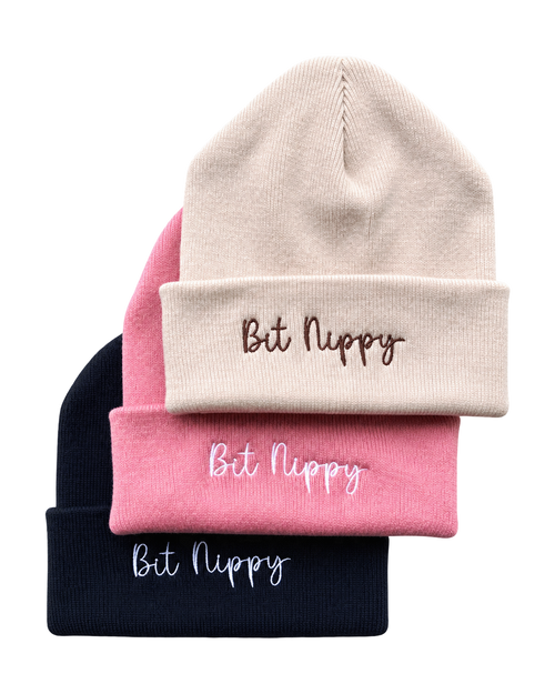 LighthouseLane cuffed beanies in beige, pink, and navy blue with Bit Nippy embroidery in a soft knit fabric