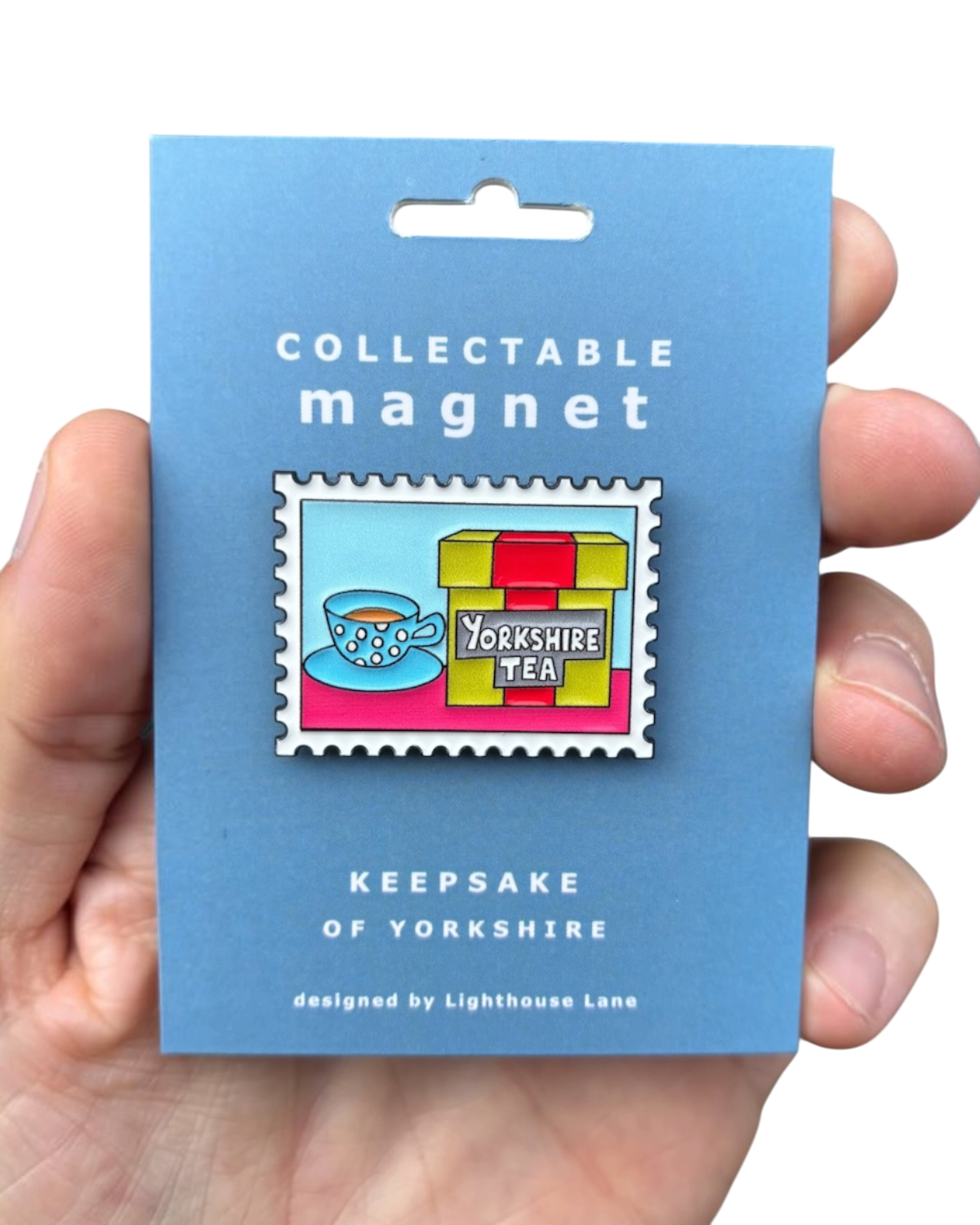 LighthouseLane Yorkshire Tea magnet featuring stamp-style artwork of a tea cup and box on a blue backing card