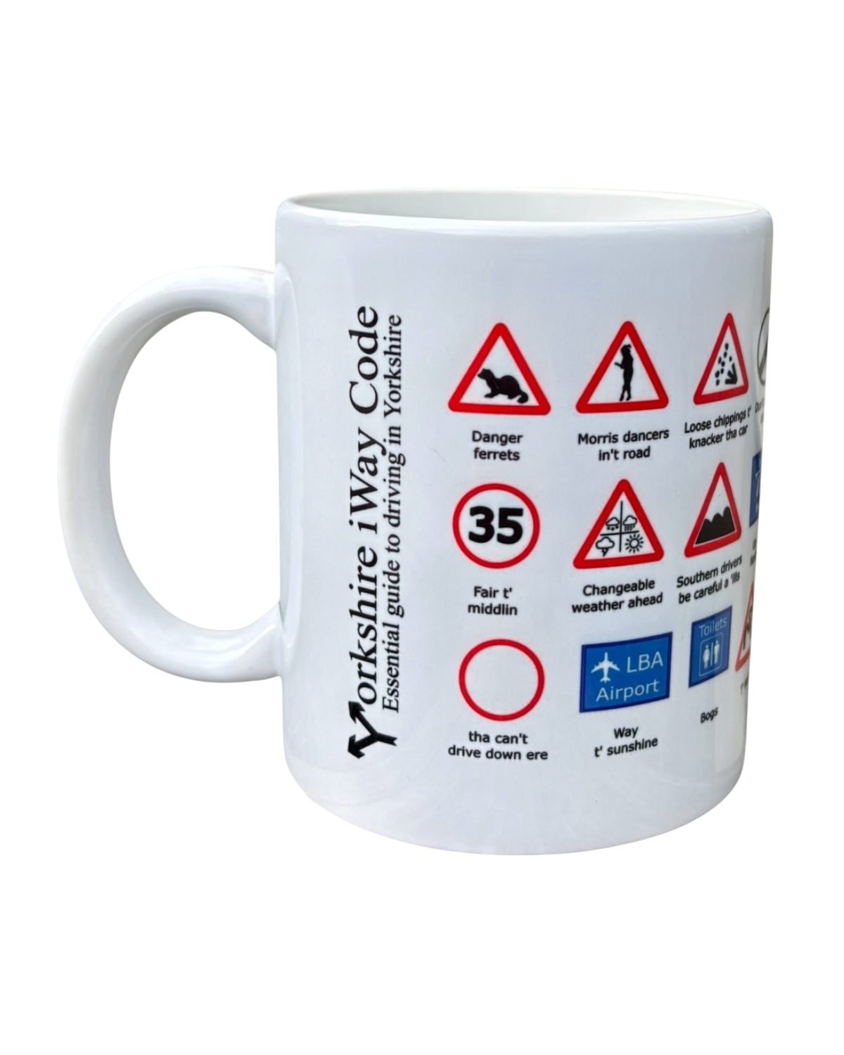 LighthouseLane white ceramic mug featuring a humorous Yorkshire Highway Code design with regional dialect signs.