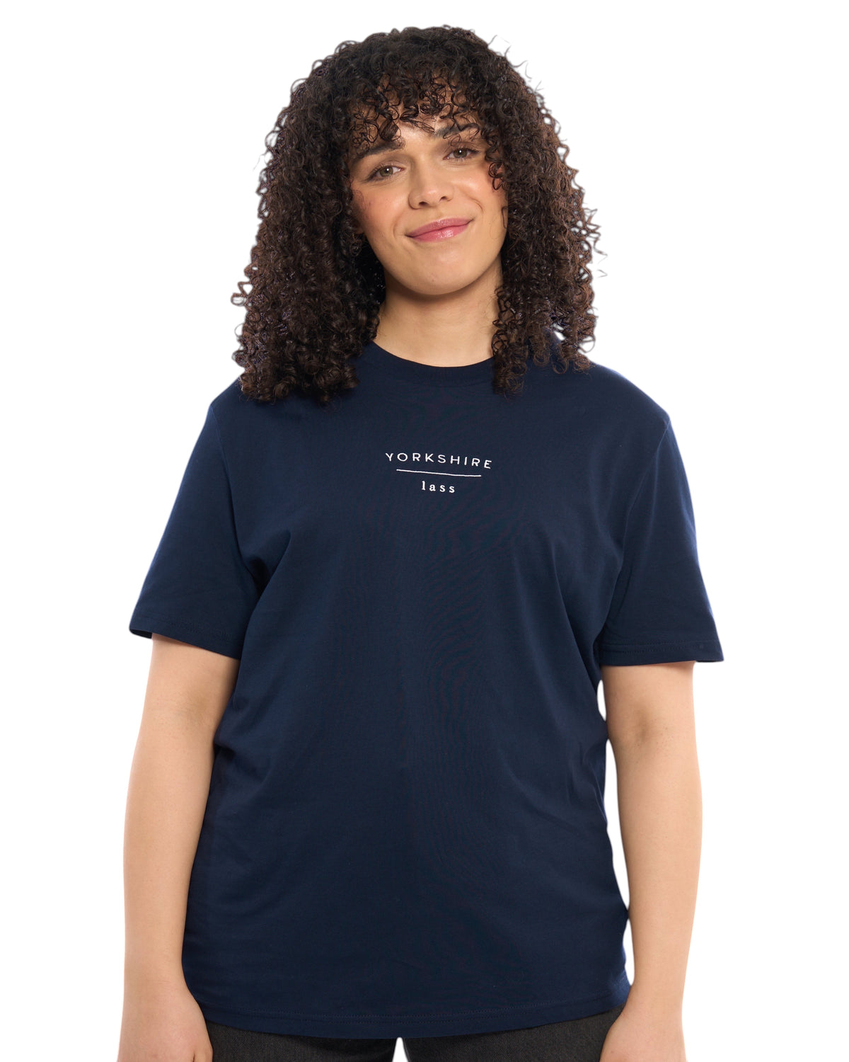 Close up shot of a Yorkshire lass dark t-shirt, with embroidered slogan / logo. 100% organic cotton premium heavy thick quality t-shirt top. Minimalist design. Northern clothing. Women's unisex t-shirts.