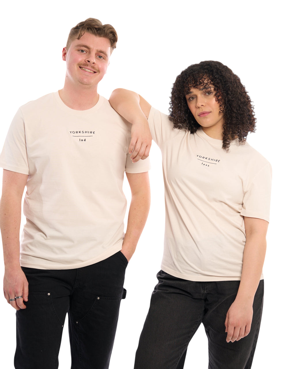 Male and female models wearing Yorkshire lad and Yorkshire lass neutral t-shirt, with embroidered slogan / logo. 100% organic cotton premium heavy thick quality t-shirt top. Minimalist design. Northern clothing. Women's unisex t-shirt