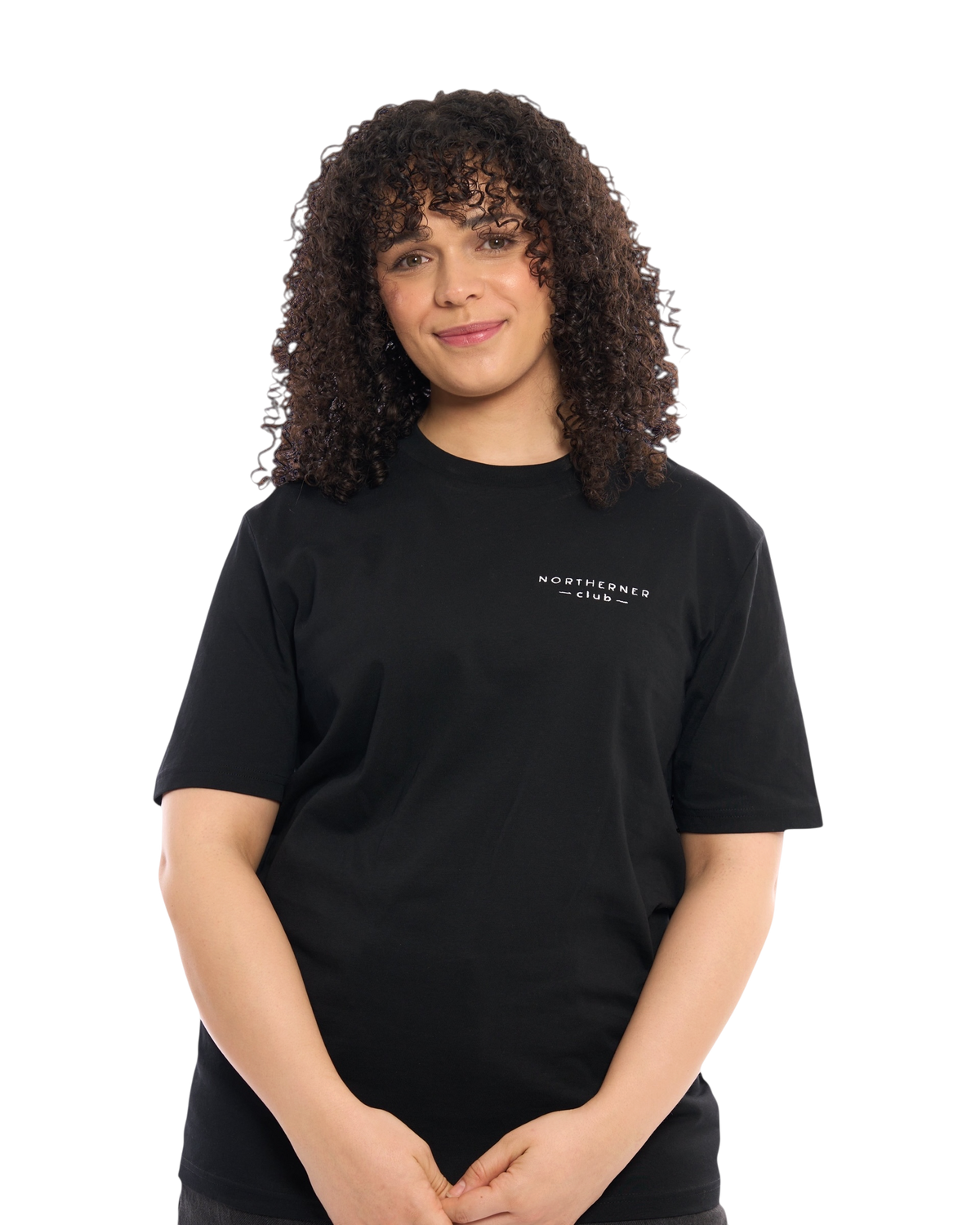 LighthouseLane black organic cotton unisex T-shirt with Northerner Club embroidered slogan worn by a curly-haired model