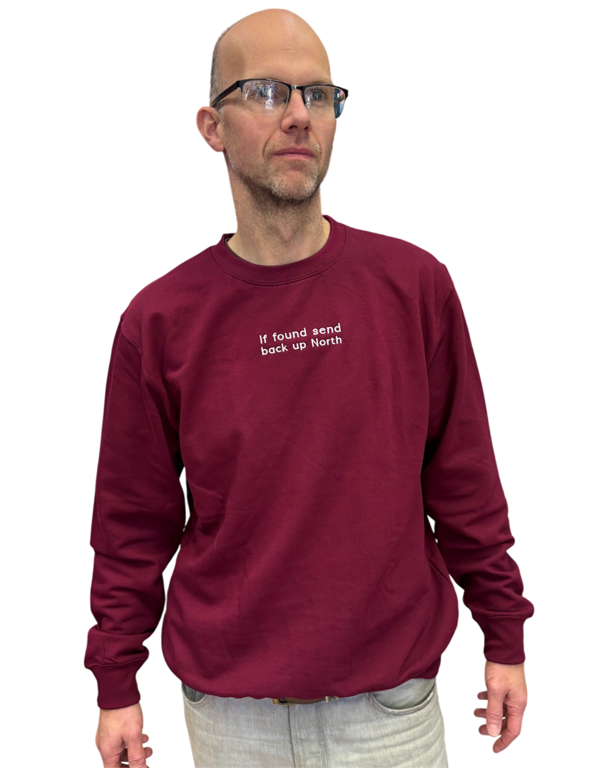 LighthouseLane burgundy unisex sweatshirt with If Found Send Back Up North embroidered slogan worn by a man