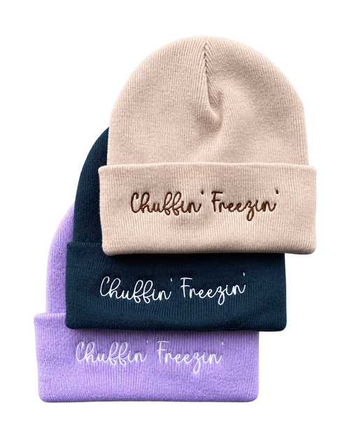 LighthouseLane cuffed beanies in beige, navy, and lilac with Chuffin' Freezin' embroidery in a soft knit fabric.