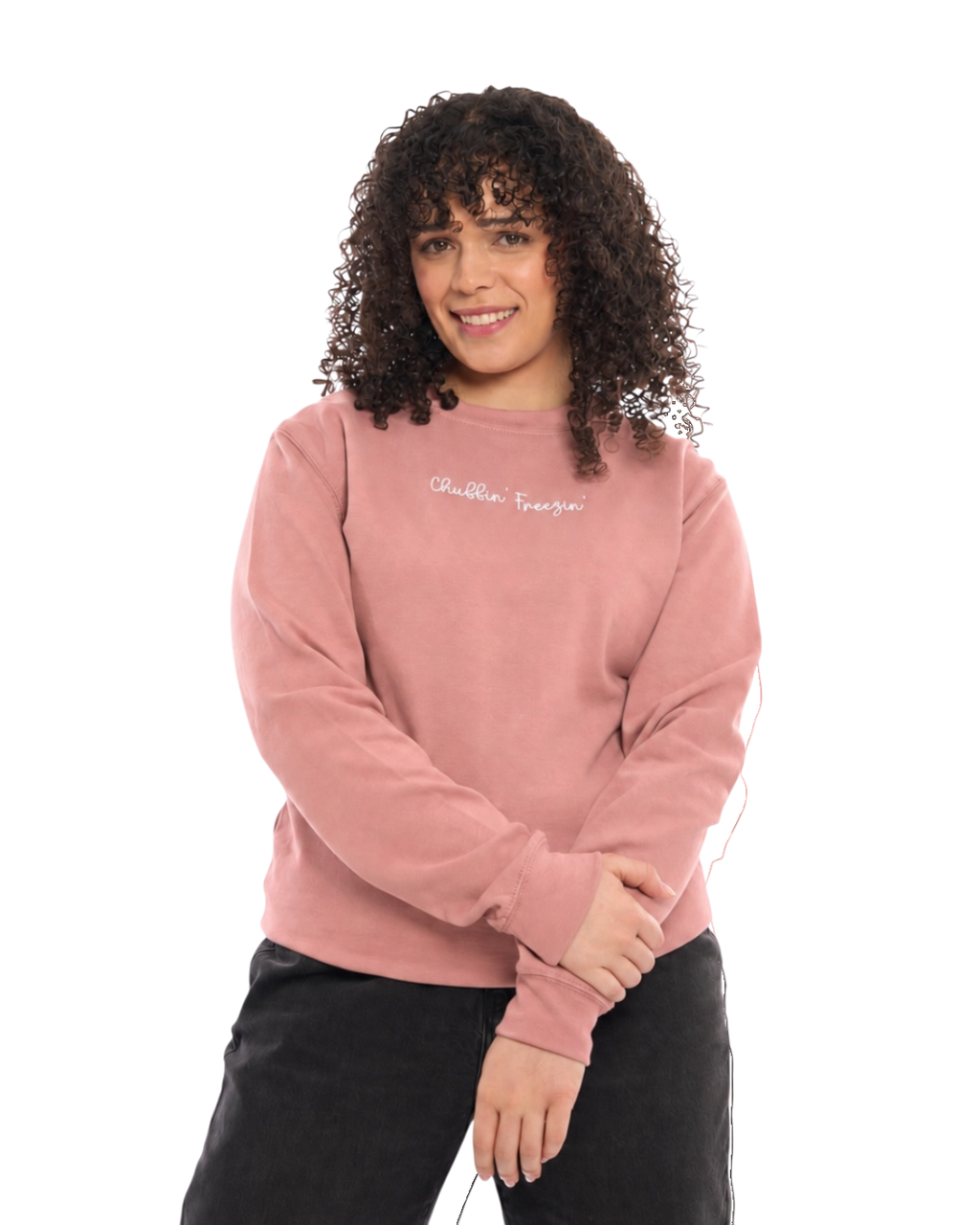LighthouseLane unisex dusty pink sweatshirt with Chuffin Freezin embroidered slogan worn by a woman with curly hair