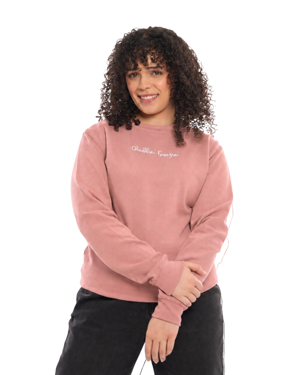 LighthouseLane unisex dusty pink sweatshirt with Chuffin Freezin embroidered slogan worn by a woman with curly hair