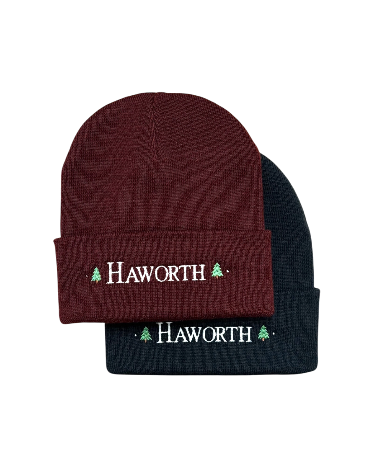 LighthouseLane burgundy and navy acrylic cuffed beanies with embroidered Haworth lettering and Christmas tree motifs.