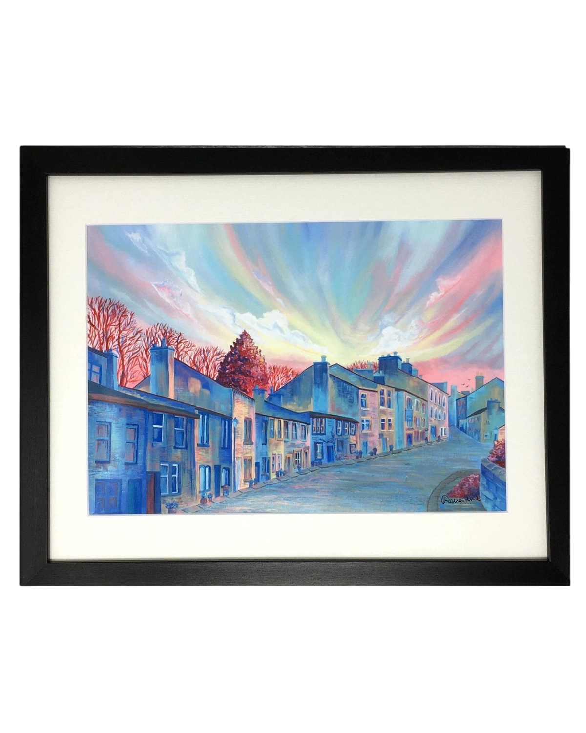 LighthouseLane framed print of Haworth Main Street featuring a vibrant sunset sky over historic Yorkshire buildings.