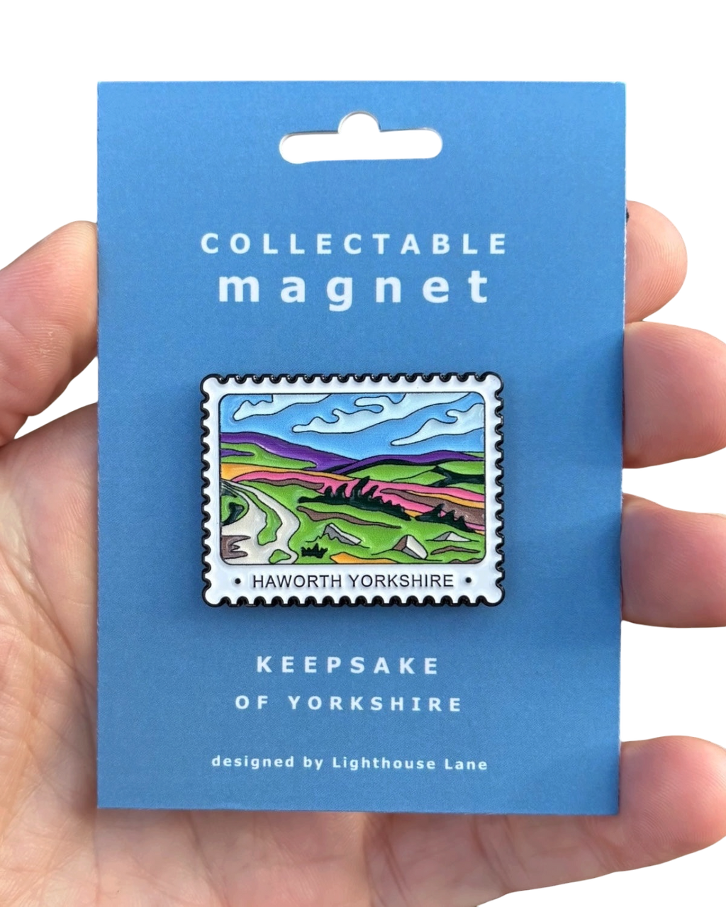 LighthouseLane Haworth Yorkshire postage-stamp style magnet featuring a colorful landscape design on a blue card