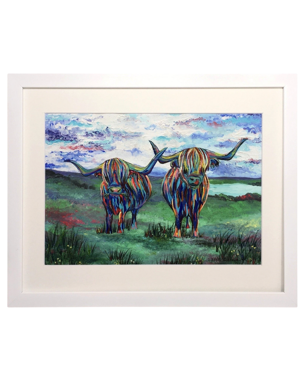 LighthouseLane framed art print featuring two colourful hand-painted highland cows in a vibrant Scottish landscape
