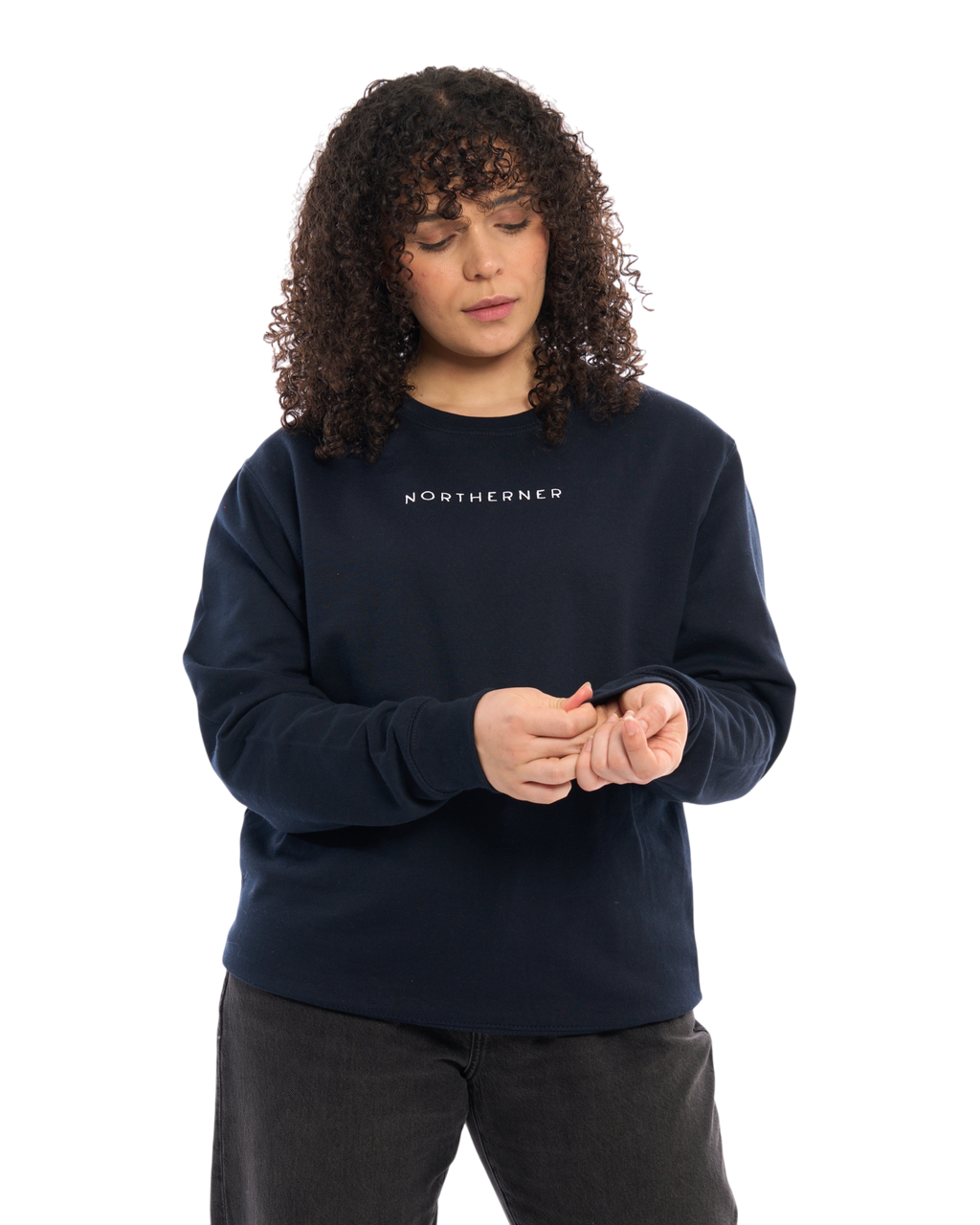 Model wearing a navy blue LighthouseLane Northerner embroidered unisex sweatshirt with a relaxed fit.