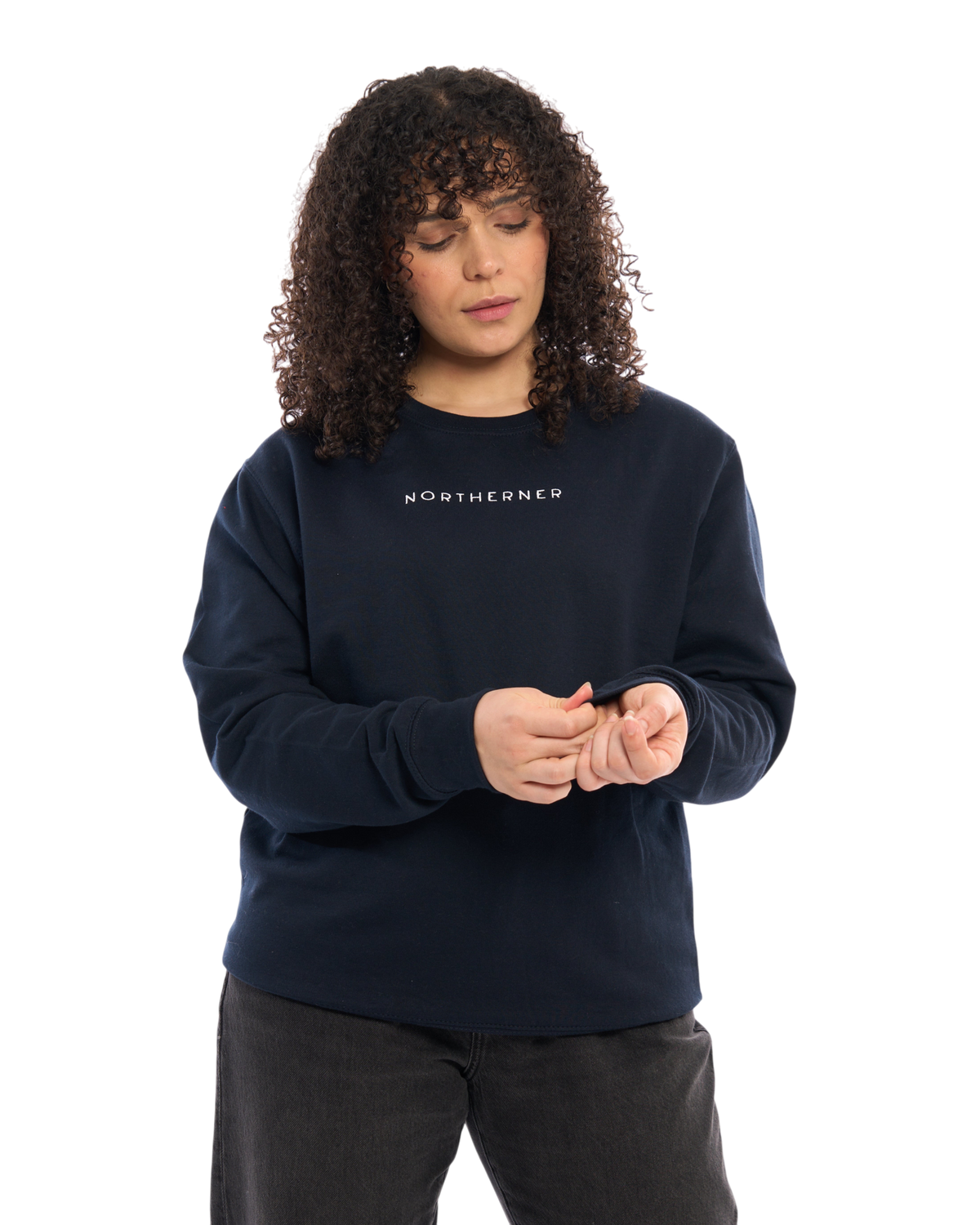 Model wearing a navy blue LighthouseLane Northerner embroidered unisex sweatshirt with a relaxed fit.