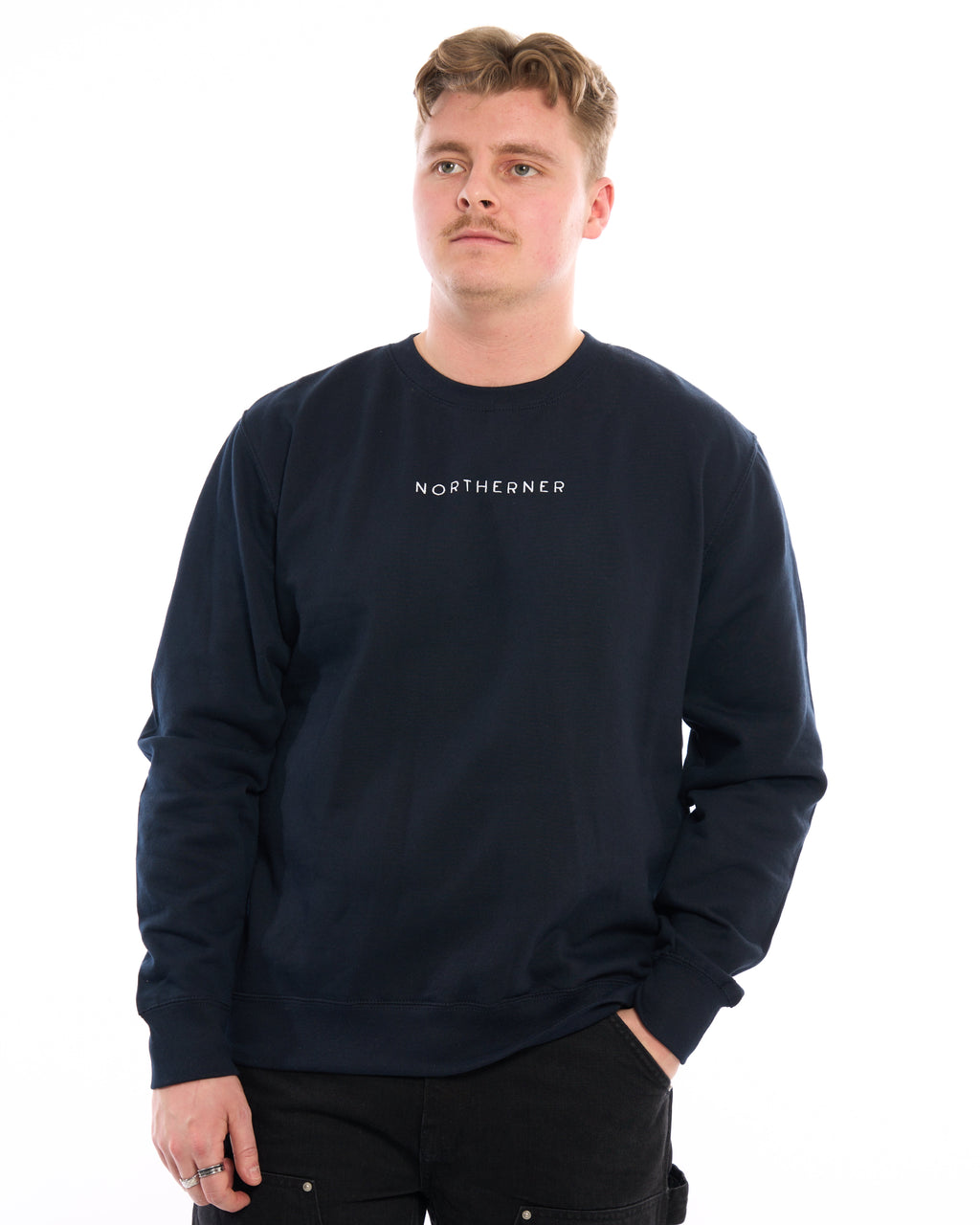 LighthouseLane navy blue unisex sweatshirt with Northerner embroidered slogan worn by a man against a white background
