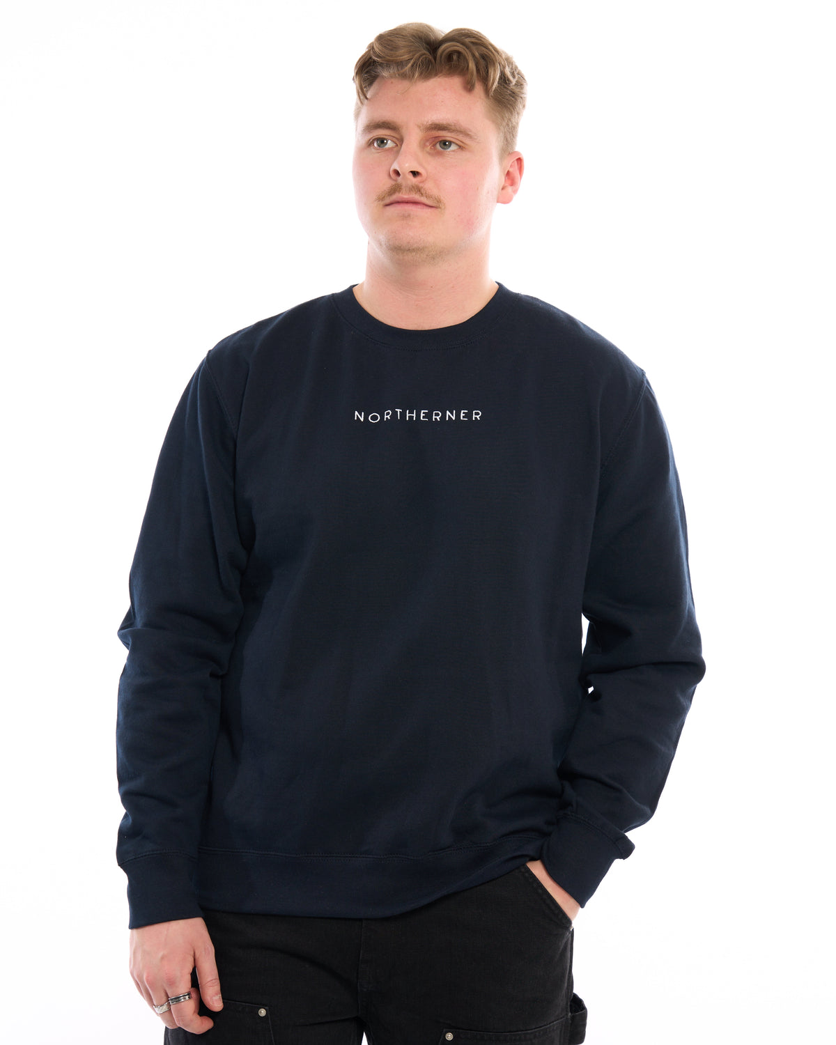 LighthouseLane navy blue unisex sweatshirt with Northerner embroidered slogan worn by a man against a white background
