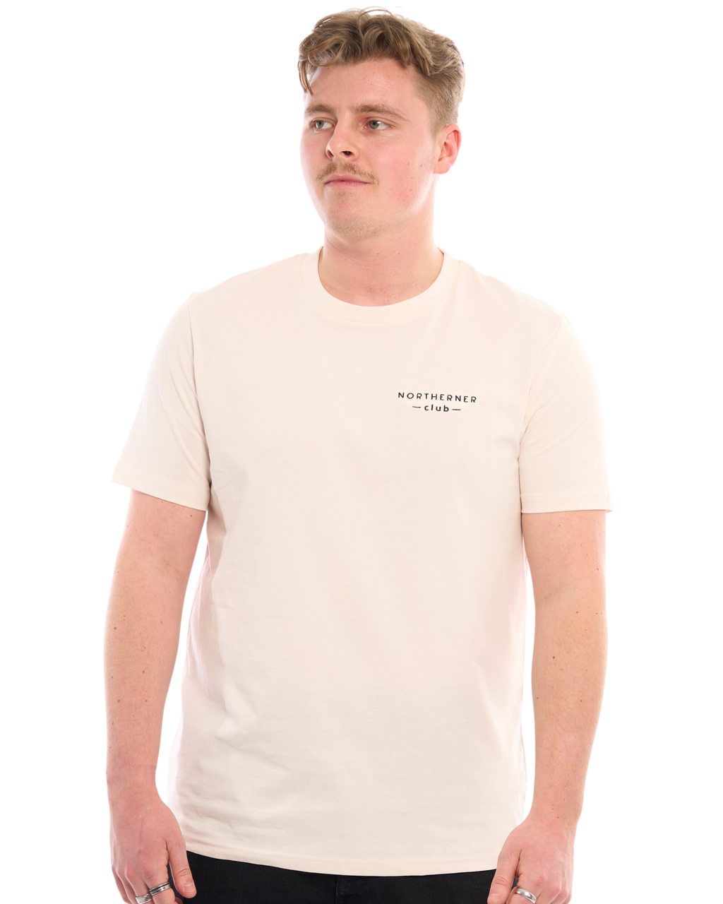 LighthouseLane Northerner Club organic cotton t-shirt in cream with black chest embroidery worn by a male model