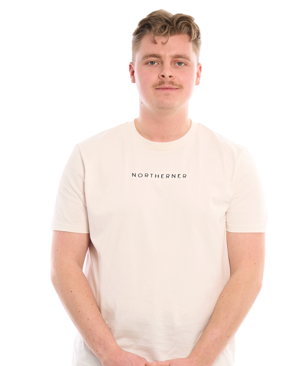 LighthouseLane Northerner cream organic cotton unisex t-shirt with black embroidered slogan on a male model