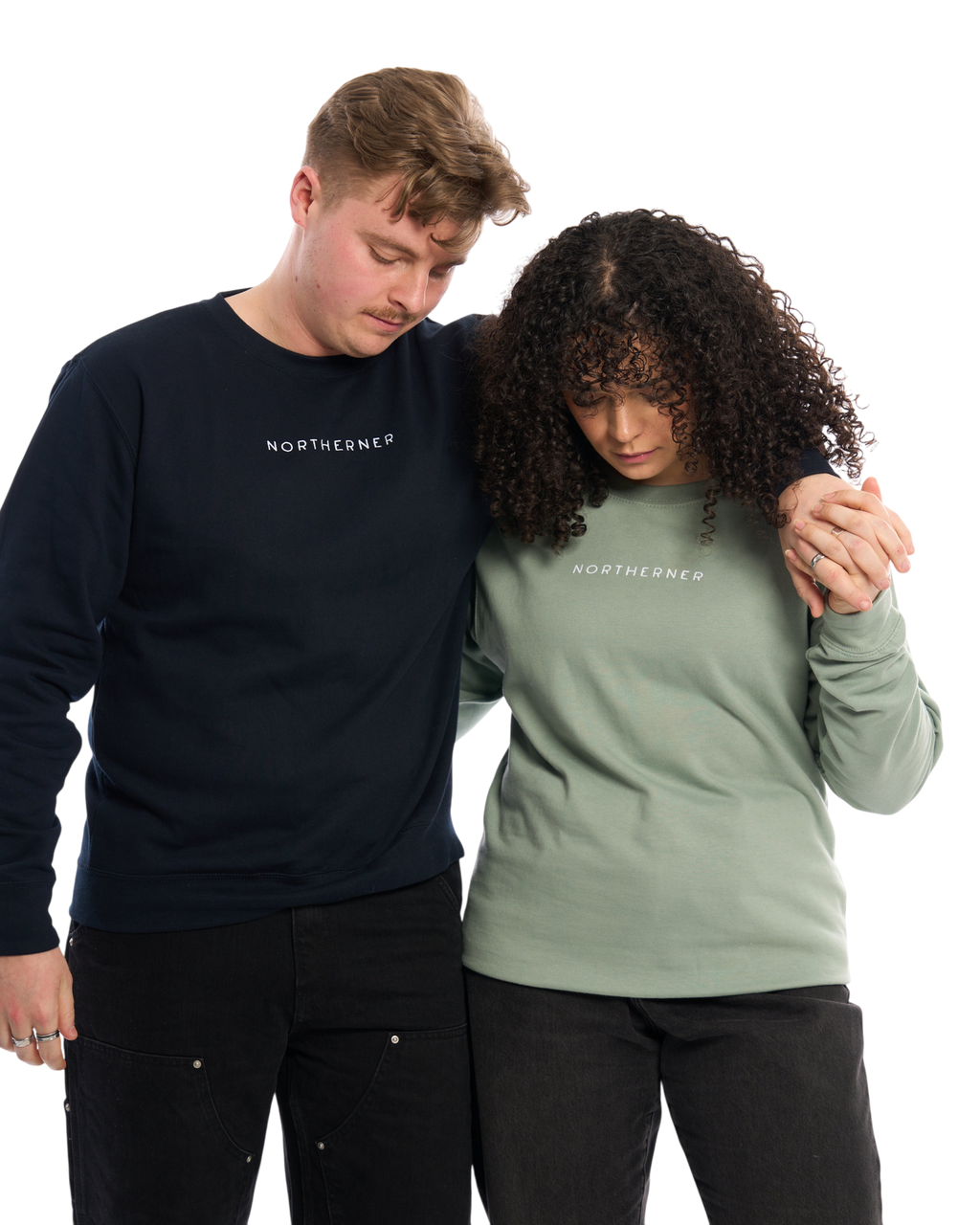 LighthouseLane unisex Northerner embroidered sweatshirts in navy and sage green worn by a couple