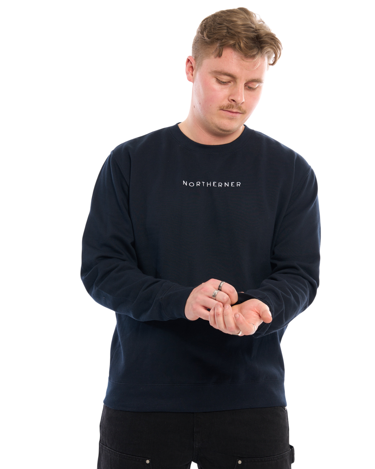 LighthouseLane navy blue unisex sweatshirt with Northerner embroidered text worn by a man on a white background.