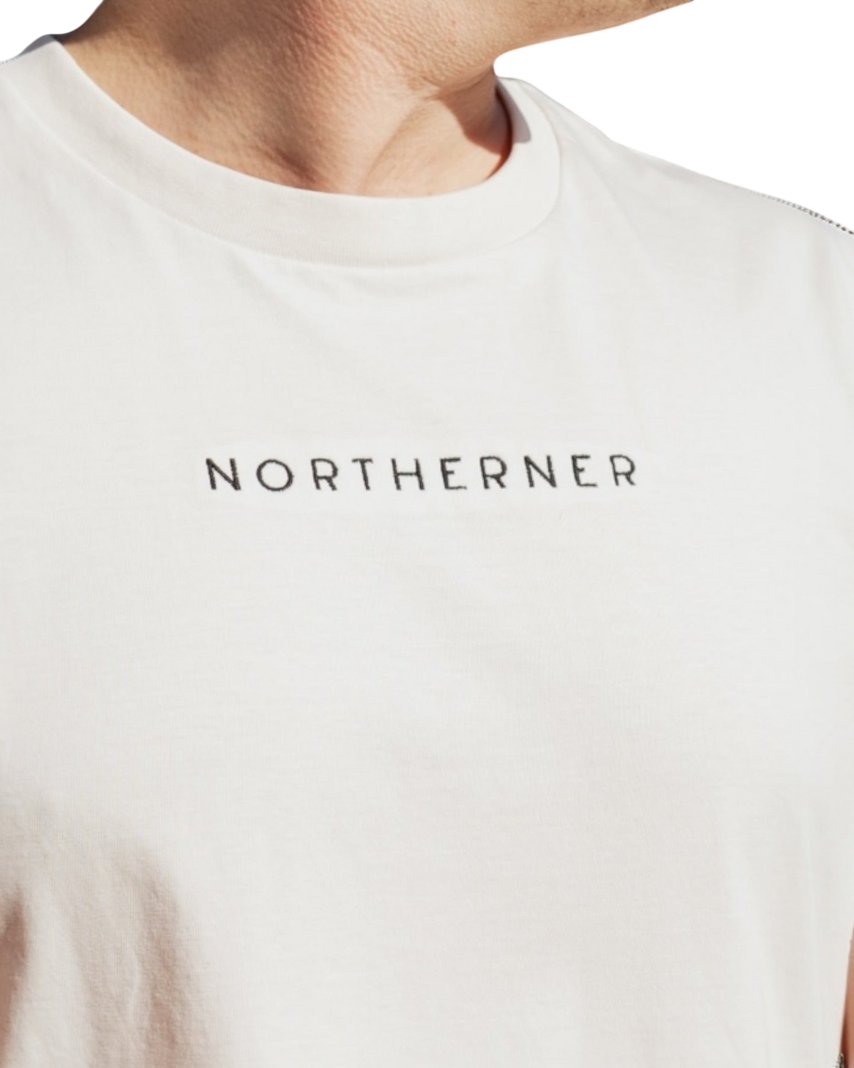 LighthouseLane white organic cotton unisex t-shirt featuring black Northerner embroidered slogan on the chest