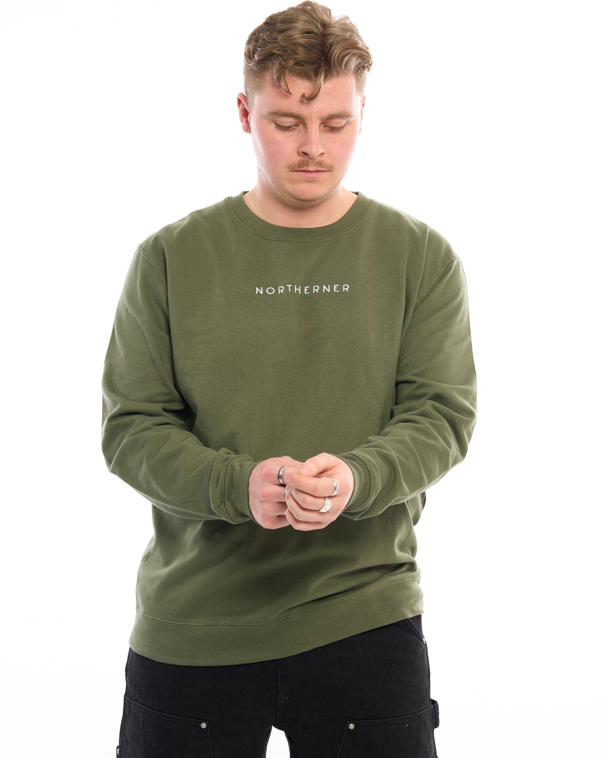 A man wearing a LighthouseLane olive green Northerner embroidered unisex sweatshirt with a relaxed fit.