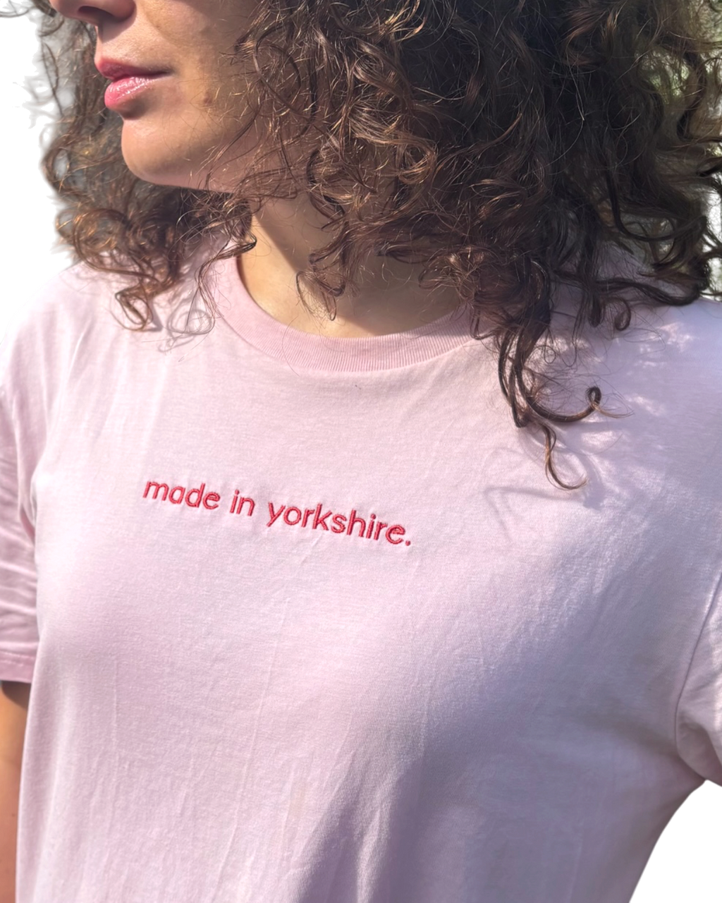 LighthouseLane pale pink organic cotton unisex t-shirt with red embroidered Made in Yorkshire slogan on the chest