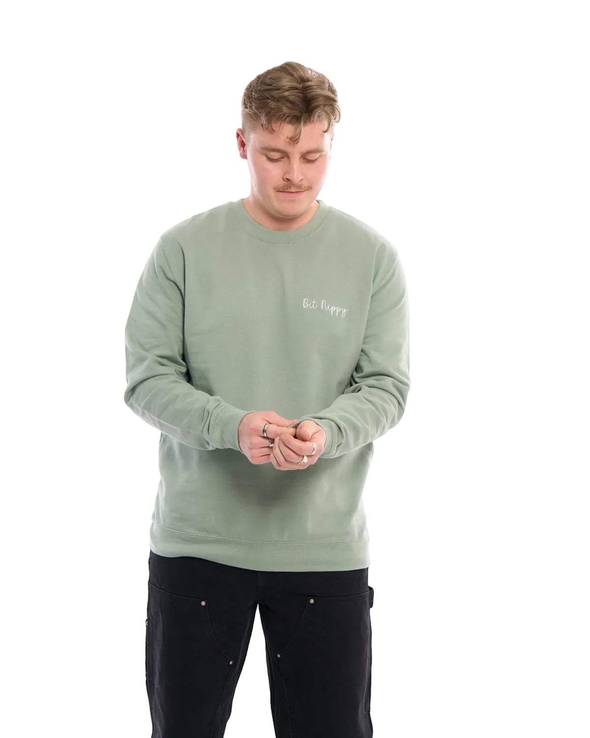 LighthouseLane sage green unisex sweatshirt with Bit Nippy embroidery worn by a man against a white background