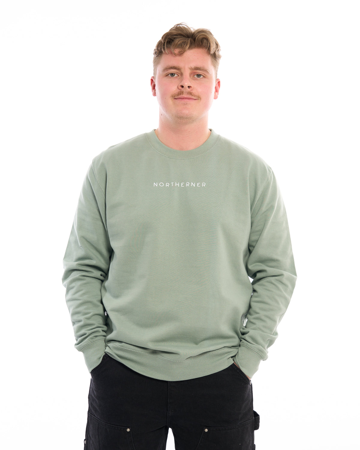 LighthouseLane sage green unisex Northerner embroidered sweatshirt worn by a man against a white background