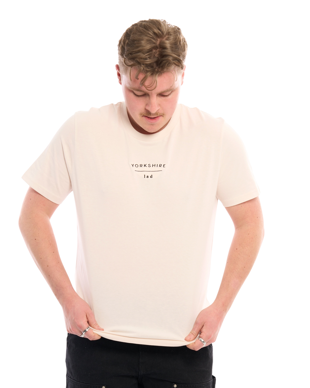 LighthouseLane unisex cream organic cotton T-shirt with Yorkshire Lad slogan embroidery worn by a man