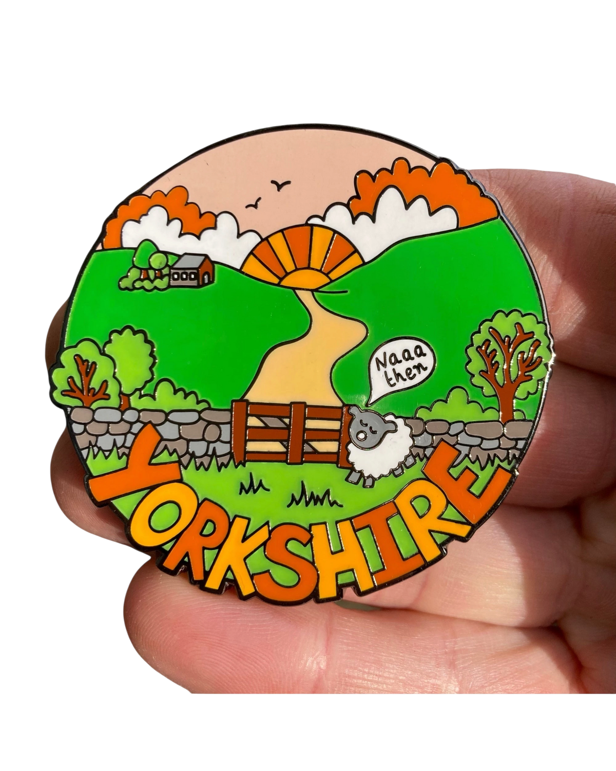 LighthouseLane Yorkshire sheep enamel magnet featuring a hand-drawn landscape with a cute sheep and sunset design.